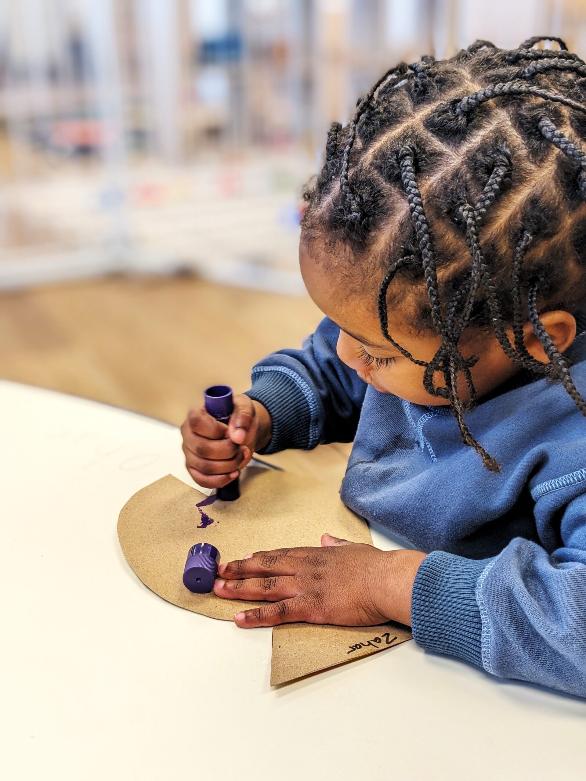 NG Kid Doing Art